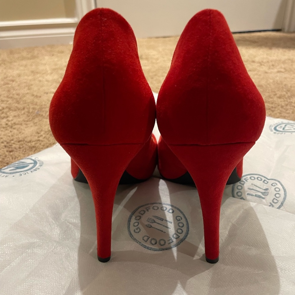 Jessica Simpson red heels